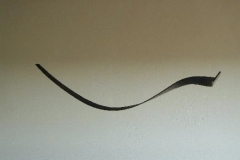 "Zeichen" Abb. 2, Holz in der Flamme gebogen, Maße ca. 180 × 20 × 5 cm³, 2006